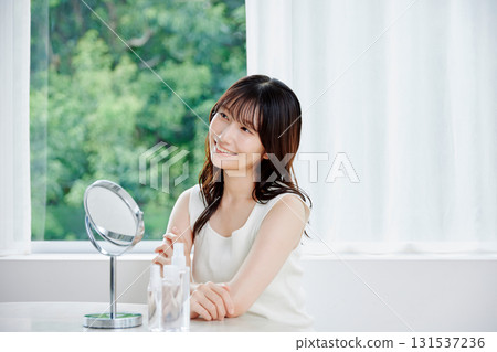 Beauty image: Young woman's skin care scene Beauty image: Young woman's skin care scene 131537236