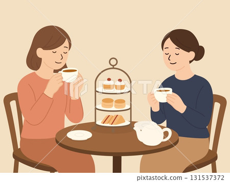 Two women enjoying afternoon tea, scones and tea 131537372