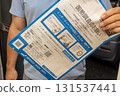Stock photo of a man delivering a census notice 131537441