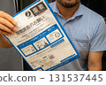 Stock photo of a man delivering a census notice 131537445