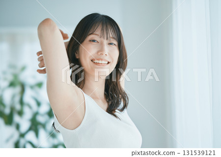 Beauty image: A woman stretching 131539121