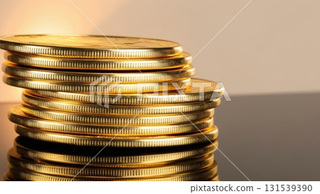Stack of freshly minted gold coins shining brilliantly under soft spotlight with fine details 131539390