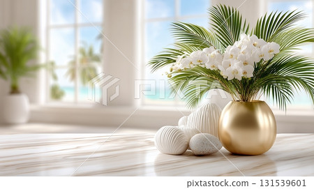 Tropical luxury decor white orchids and palm leaves in a golden vase on a marble table with a serene beach 131539601