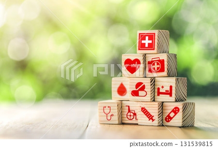 Lay out wooden blocks with icons of medical health. health insurance for your health concept. 131539815
