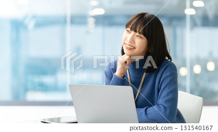 Woman/businesswoman using a computer in the office Woman/businesswoman using a computer in the office 131540167