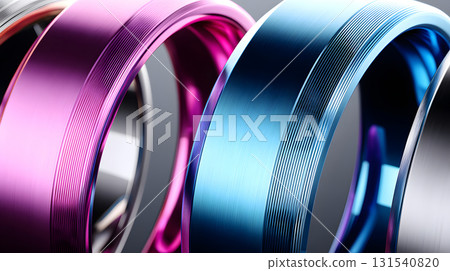 Polished metal rings in vibrant pink, blue, and silver colors showcase sleek design with engraved lines, reflecting light beautifully. These rings evoke sense of modern elegance and style Polished metal rings in vibrant pink, blue, and silver colors showcase sleek design with engraved lines, reflecting light beautifully. These rings evoke sense of modern elegance and style 131540820