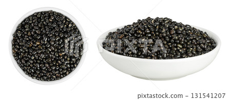 Black bean or Urad dal, black gram, vigna mungo in ceramic bowl isolated on the white background. Top view. Flat lay. Black bean or Urad dal, black gram, vigna mungo in ceramic bowl isolated on the white background. Top view. Flat lay. 131541207
