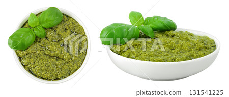 Pesto sauce in ceramic bowl isolated on white background. Top view. Flat lay. Pesto sauce in ceramic bowl isolated on white background. Top view. Flat lay. 131541225