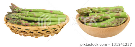 fresh asparagus in in a wicker basket isolated on white background 131541237