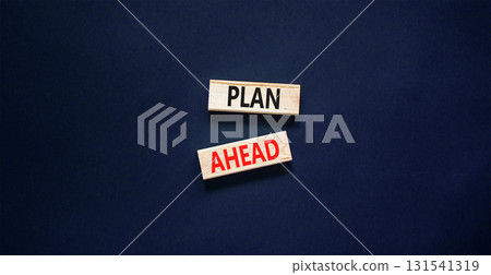 Plan ahead symbol. Concept word Plan ahead on beautiful wooden blocks. Beautiful black paper background. Business plan ahead concept. Copy space. 131541319