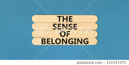 The sense of belonging symbol. Concept words The sense of belonging on beautiful wooden sticks. Beautiful blue table blue background. Business and the sense of belonging concept. Copy space. The sense of belonging symbol. Concept words The sense of belonging on beautiful wooden sticks. Beautiful blue table blue background. Business and the sense of belonging concept. Copy space. 131541375