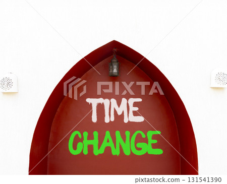 Time change symbol. Concept word Time change on beautiful white and red wall. Beautiful white and red wall background. Business time change concept. Copy space. Time change symbol. Concept word Time change on beautiful white and red wall. Beautiful white and red wall background. Business time change concept. Copy space. 131541390