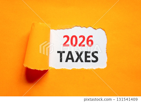 2026 taxes new year symbol. Concept words 2026 taxes on beautiful white paper. Beautiful orange paper background. Business and 2026 taxes new year concept. Copy space. 2026 taxes new year symbol. Concept words 2026 taxes on beautiful white paper. Beautiful orange paper background. Business and 2026 taxes new year concept. Copy space. 131541409