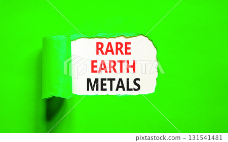 Rare earth metals symbol. Concept words Rare earth metals on beautiful white paper. Beautiful green paper background. Business and rare earth metals concept. Copy space. 131541481