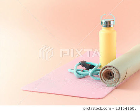 Fitness Mat with Water Bottle and Jump Rope on Pastel Background Fitness Mat with Water Bottle and Jump Rope on Pastel Background 131541603