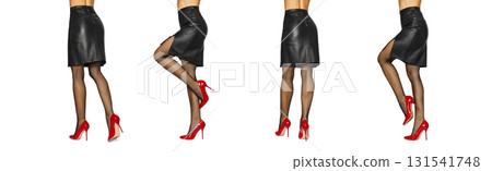 Collage of sexy female legs in black fishnet tights and high heels on white background 131541748