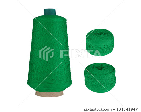Green Thread Spool and Balls on White Background Green Thread Spool and Balls on White Background 131541947