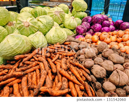 vegetables on the supermarket counter. Healthy natural food concept. carrots, cabbage, beets 131542060