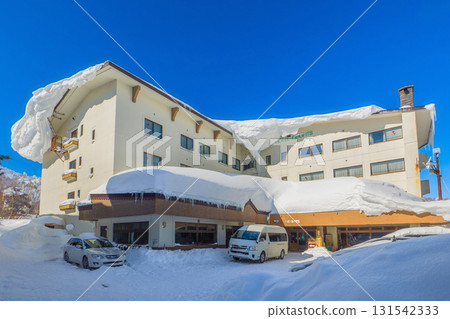 A ski resort hotel in Shiga Kogen with a huge snow cornice on its roof (Yamanouchi Town, Nagano Prefecture) A ski resort hotel in Shiga Kogen with a huge snow cornice on its roof (Yamanouchi Town, Nagano Prefecture) 131542333