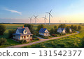 Countryside landscape with two-storey town and windmills in the fields. 131542377