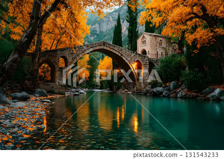 Tranquil Autumn Scene: Historic Stone Bridge Over Pristine River Generative AI 131543233