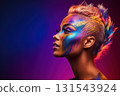 Side view profile portrait of girl with creative art make-up for Pride. Bright LGBT make-up and rainbow hair Side view profile portrait of girl with creative art make-up for Pride. Bright LGBT make-up and rainbow hair 131543924