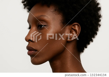 Portrait of Young Dark-Skinned Woman 131544134