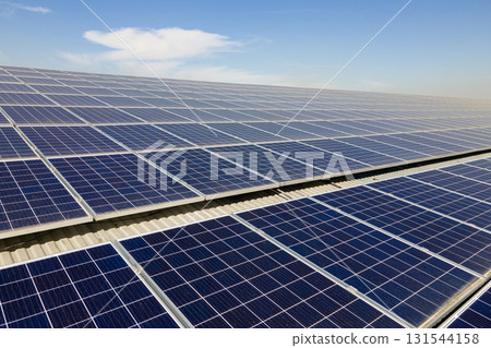 Photovoltaic panels for producing clean ecological electric energy. Commercial building with solar roof. Renewable electricity with zero emission concept 131544158