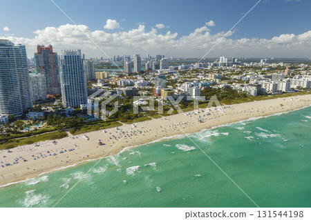 Miami Beach city with high luxury hotels and condos and sandy beachfront Miami Beach city with high luxury hotels and condos and sandy beachfront 131544198