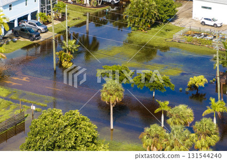 Hurricane flooded homes in residential community in Florida, USA. Aftermath of natural disaster Hurricane flooded homes in residential community in Florida, USA. Aftermath of natural disaster 131544240
