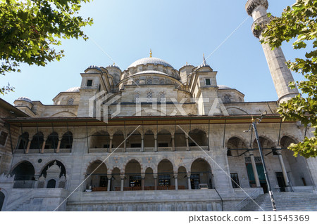 New Mosque (Yeni Cami) in Eminonu Square, Istanbul, Turkey, view from the square New Mosque (Yeni Cami) in Eminonu Square, Istanbul, Turkey, view from the square 131545369