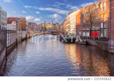 Floating flower market on canal in Amsterdam Netherlands 131545622