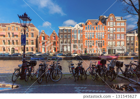 Bicycles along canal in Amsterdam Netherlands Bicycles along canal in Amsterdam Netherlands 131545627