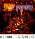 People enjoying a Halloween party 131546115
