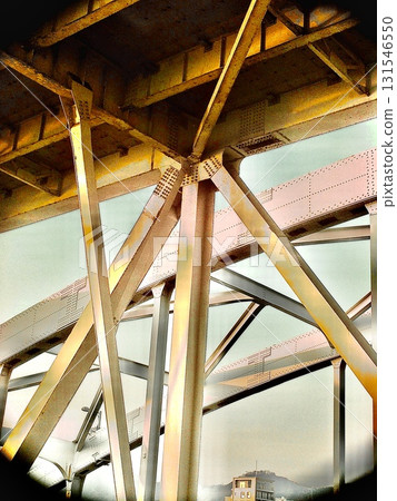 Urban architecture composition looking up at a steel-framed bridge 131546550