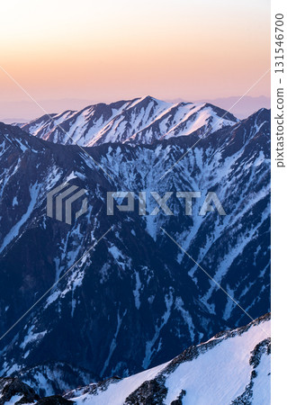 Magic Hour Early Morning in the Ushiro-Tateyama Mountain Range, Mount Renge (View from the North Peak of Mount Betsuyama) Climbing Mount Tateyama and Mount Betsuyama in the Northern Alps with Snow Remaining 131546700