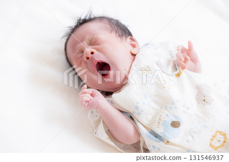 Newborn baby taking a nap 131546937