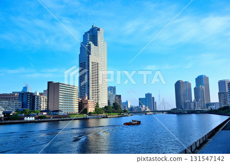 Tokyo: Sumida River and St. Luke's Garden under the early morning blue sky Tokyo: Sumida River and St. Luke's Garden under the early morning blue sky 131547142