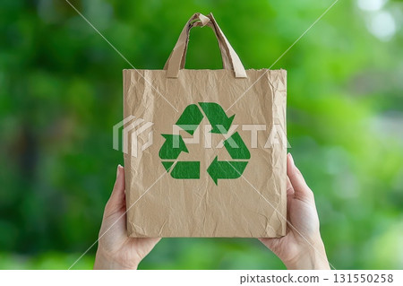 Woman Holding Recycling Paper Bag Outdoors Woman Holding Recycling Paper Bag Outdoors 131550258