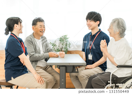 Occupational therapists working at nursing and rehabilitation facilities and senior men undergoing rehabilitation Occupational therapists working at nursing and rehabilitation facilities and senior men undergoing rehabilitation 131550449