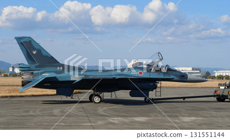 Japan Air Self-Defense Force F-2 fighter jet being towed Japan Air Self-Defense Force F-2 fighter jet being towed 131551144