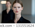 Young Woman with Natural Skin Texture and Blue Eyes Gazing Forward. 131551624