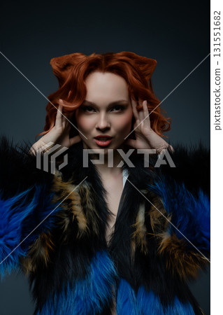 Beauty woman showcases creative body art with fur in a studio setting 131551682