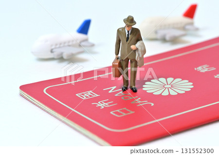 Businessman and plane Businessman and plane 131552300