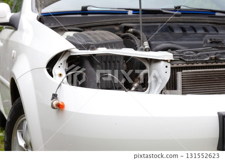 Malfunctioning car with opened hood 131552623