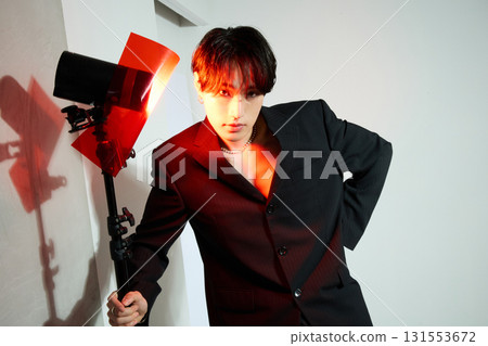 Portrait of a cool young Asian man with makeup 131553672