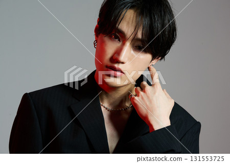 Portrait of a cool young Asian man with makeup 131553725