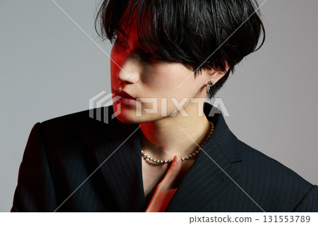 Portrait of a cool young Asian man with makeup Portrait of a cool young Asian man with makeup 131553789