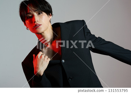 Portrait of a cool young Asian man with makeup Portrait of a cool young Asian man with makeup 131553795