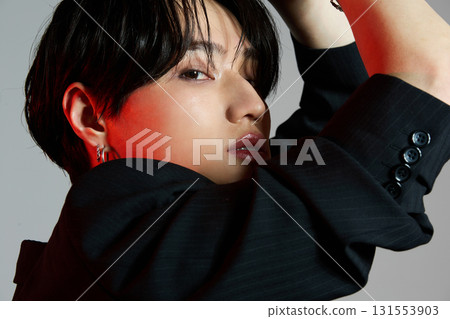 Portrait of a cool young Asian man with makeup Portrait of a cool young Asian man with makeup 131553903